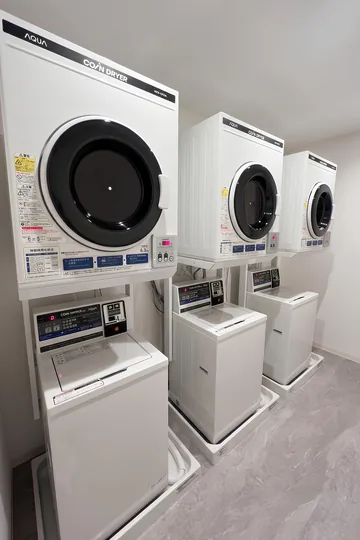 2階ランドリールームの洗濯機と乾燥機